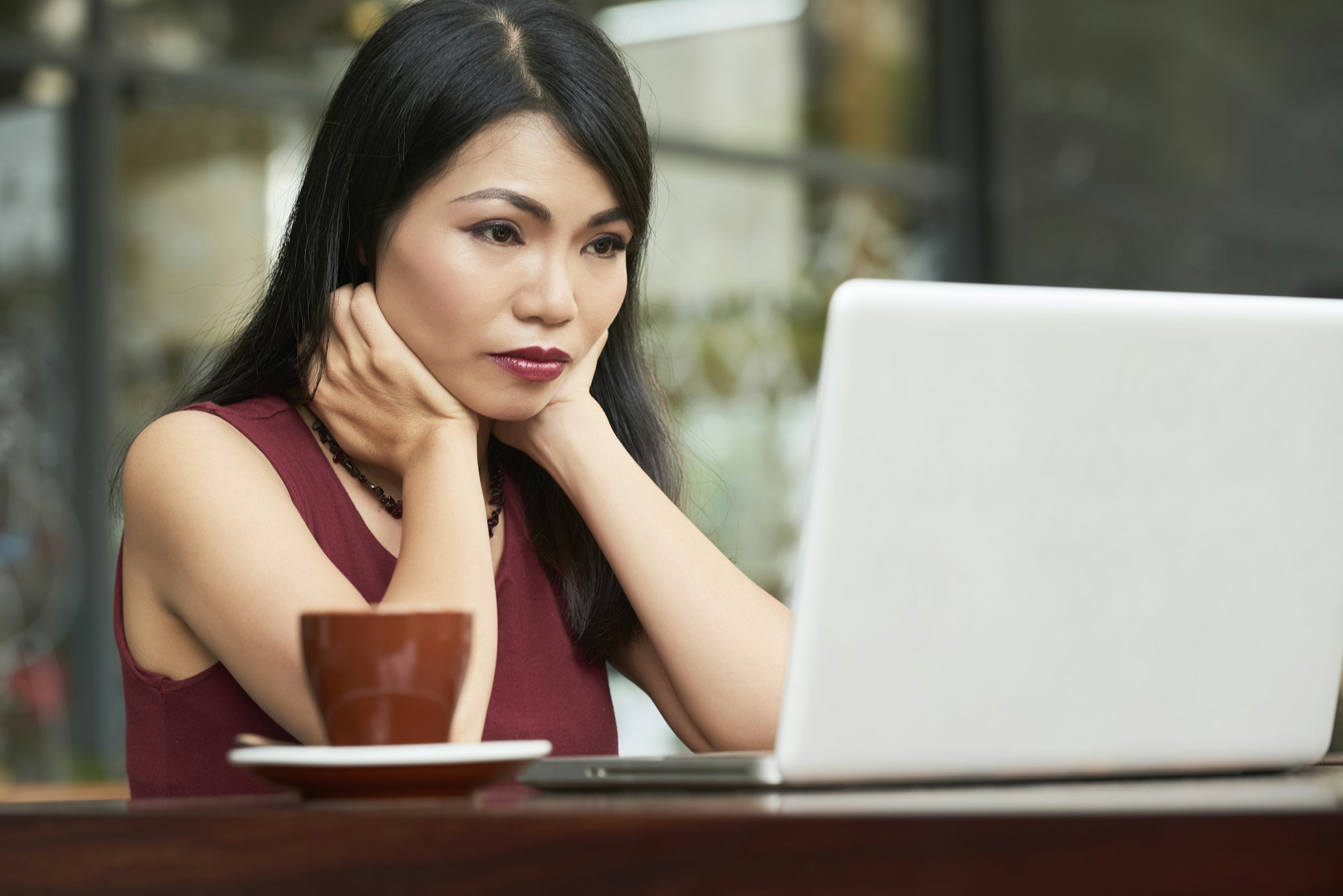 Businesswoman reading article